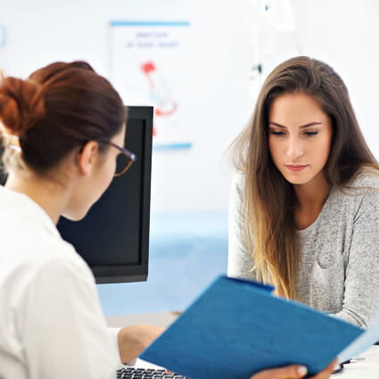 Woman looking at folder