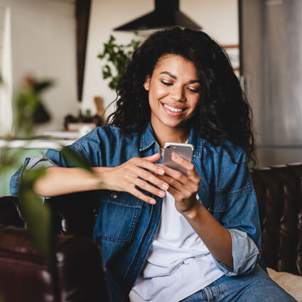 woman looking at her phone
