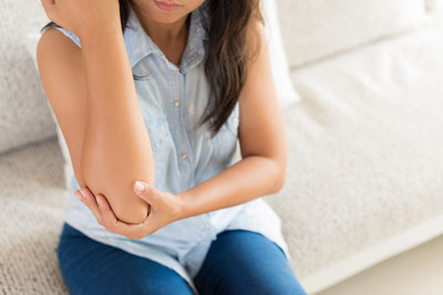 Woman with elbow pain