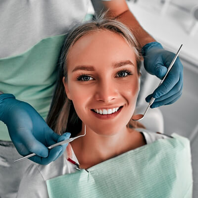woman smiling before dental checkup