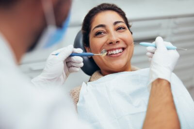 Woman smiling in dental chair