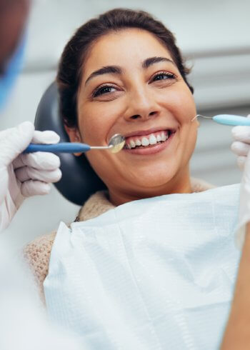 Woman smiling during dental visit