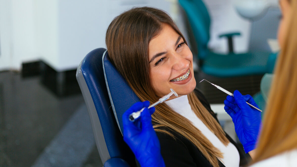 Woman with braces dental appointment