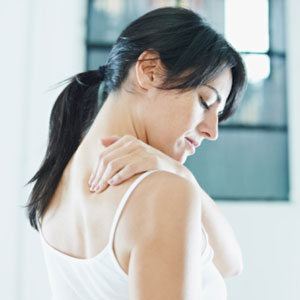 woman with upper back pain