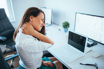 woman working with neck pain