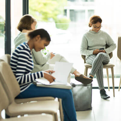 patients sitting in a waiting room