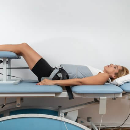 Female patient treated with spinal decompression
