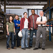 Men and women in a contruction site