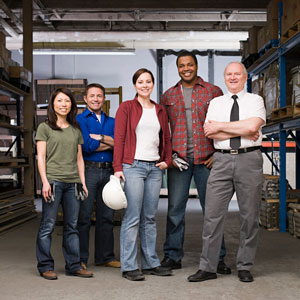 workers  in warehouse smiling