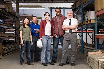 Employees standing in a warehouse