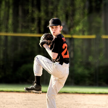 Boy playing baseball