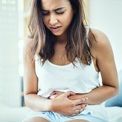 young girl with stomach pain
